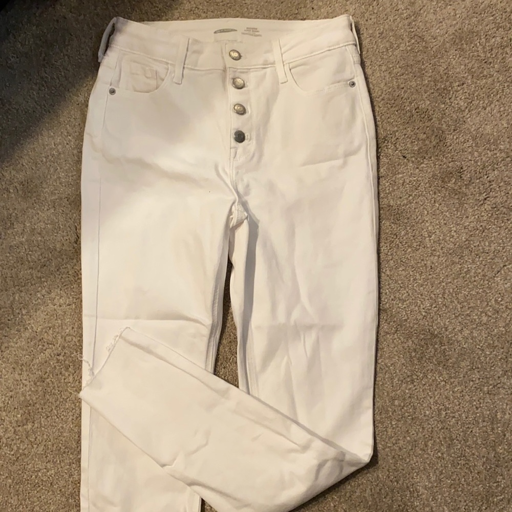 White skinny jeans with button fly